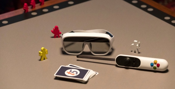 Tilt Five's AR googles, gameboard, and wand.