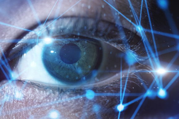 Woman's eye and closeup network connection.