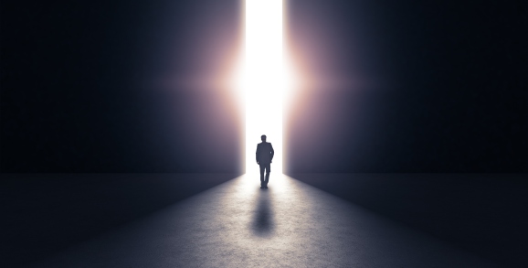 Person walking towards light concept. 3d rendering