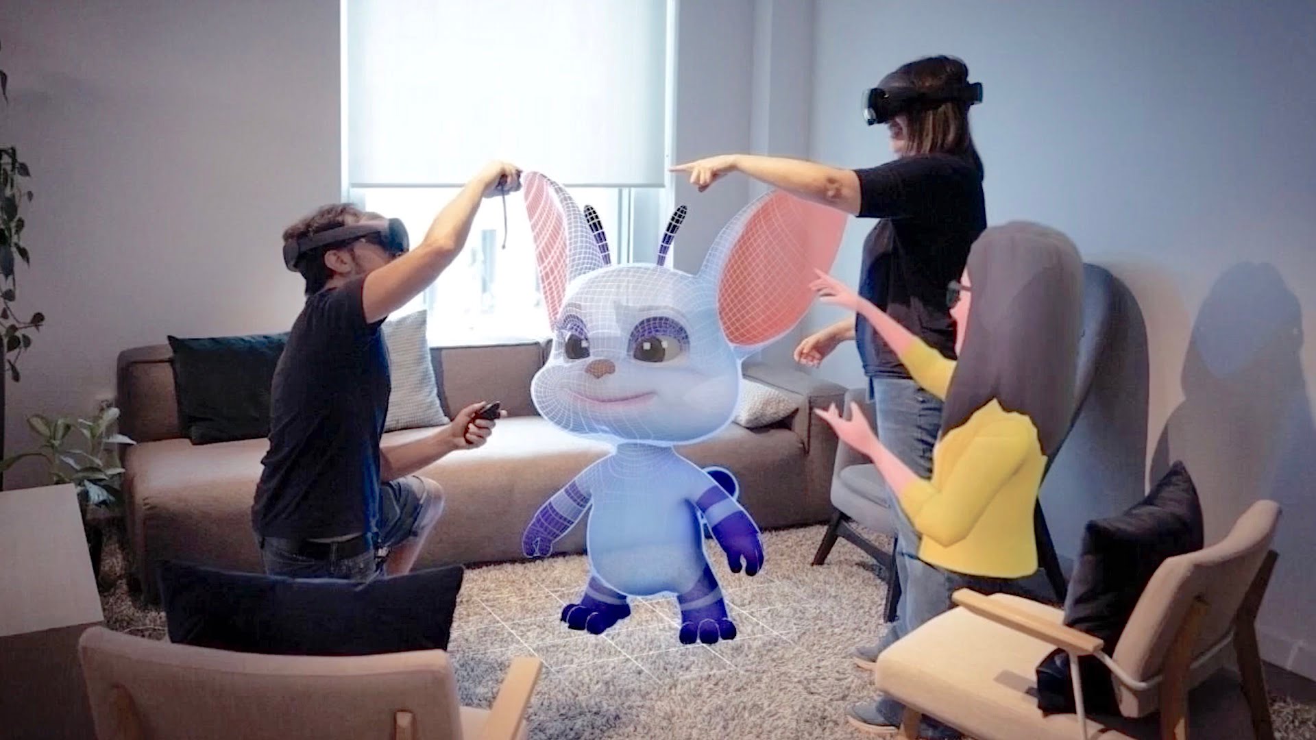 Zwei Nutzer:inenn mit Quest Pro und ein Avatar interagieren mit einem 3D-Modell im gleichen physischen Raum.